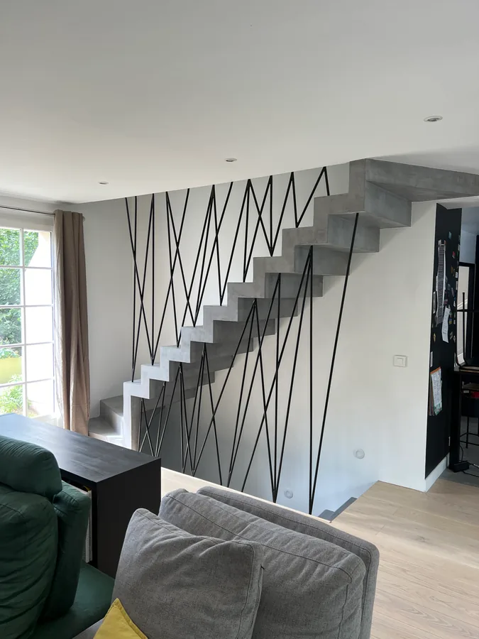 Rampe d'escalier en fer forgé, L'Art de Faire