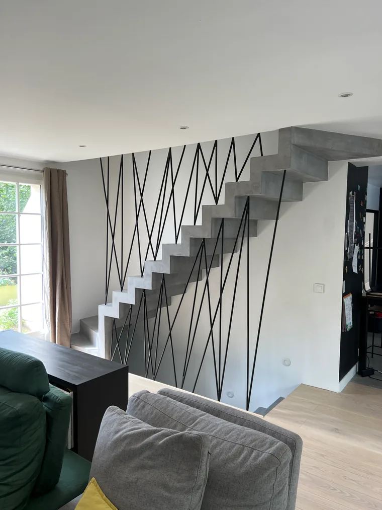 Rampe d'escalier en fer forgé, L'Art de Faire
