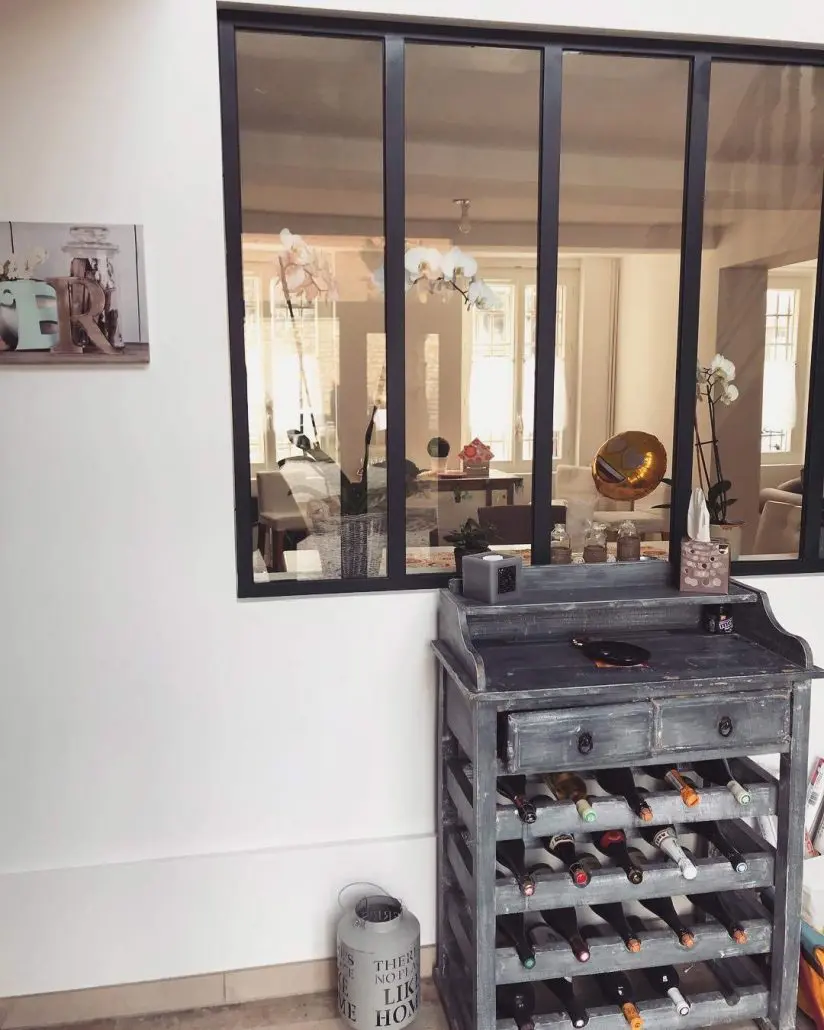 Verrière d'intérieur en acier noir séparant deux pièces de vie, L'Art de Faire